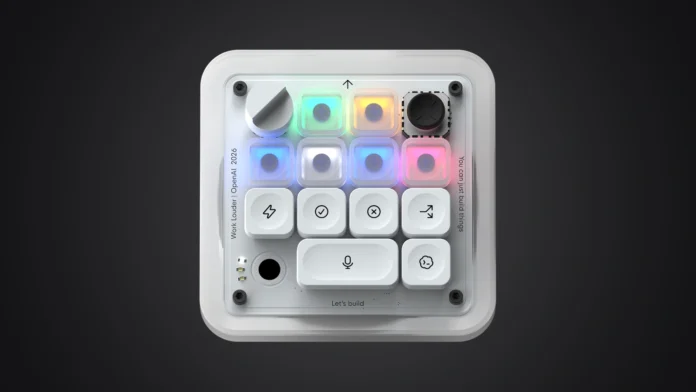 Top-down view of the OpenAI Codex Micro keypad isolated on a premium charcoal and black radial gradient backdrop.