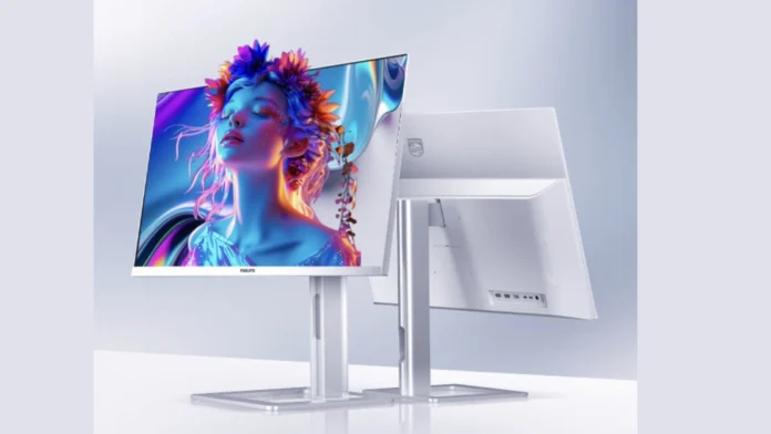 Front and back view of the white Philips 27E2N6900QW monitor standing on a white table.