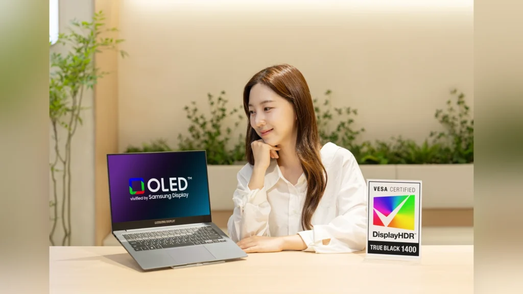 Samsung’s New Laptop OLED Hits 1,600 Nits and Lasts Twice as Long 2 Diagram showing the comparative stack structure of a single-stack OLED panel versus a tandem OLED panel with two light-emitting layers.