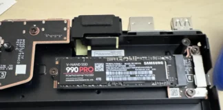 Valve Steam Machine Supports 4TB NVMe SSD Upgrades Close-up view of a 4TB Samsung 990 PRO NVMe M.2 SSD installed inside the open chassis of a Steam Machine console.