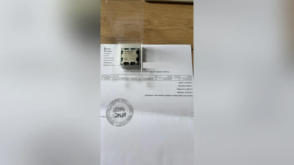 Redditor Orders Ryzen 7 7800X3D, Receives 9800X3D Instead 1 Assembled desktop computer hardware showing a CPU cooler and an RTX 5070 Ti graphics card.