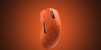 Yunzii Launches M2 Dual 8K Custom Wireless Gaming Mouse The isolated orange Yunzii M2 wireless gaming mouse set against a custom premium orange and charcoal radial gradient spotlight.