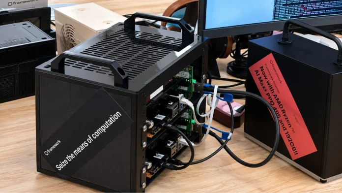 Framework Desktop prototype running AMD Ryzen AI Max+ PRO 495 with 192GB unified memory during hardware testing.