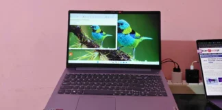 How to Take a Screenshot on a Lenovo Laptop (Windows 10 & 11) Lenovo laptop running Windows 11 displaying a screenshot example on the screen while connected to an external device