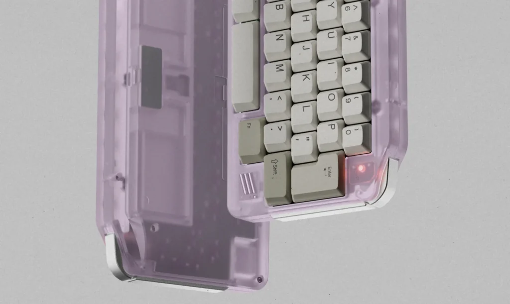 KeyBoy Advance Keyboard Opens Group Buy at $275 5 Transparent purple KeyBoy Advance mechanical keyboard case with white and olive keycaps, inspired by the classic Game Boy Advance handheld.