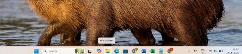 How to Take a Screenshot on a Lenovo Laptop (Windows 10 & 11) 9 Windows taskbar showing the File Explorer icon used to access saved screenshots