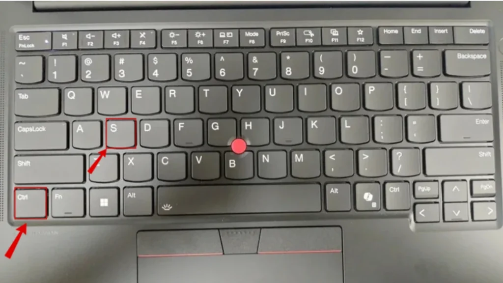 How to Take a Screenshot on a Lenovo Laptop (Windows 10 & 11) 7 Keyboard highlighting the Ctrl and S keys used to save a screenshot after capturing it with the Snipping Tool