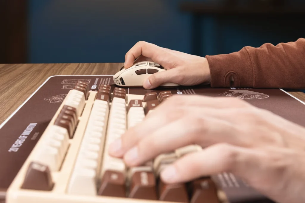 Pulsar Feinmann F01 Noctua Edition gaming mouse paired with a matching mechanical keyboard.