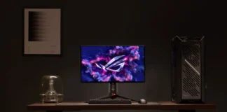ASUS ROG Releases Swift PG27UCWM, PG32UCWM With Tandem RGB OLED ASUS ROG Swift OLED PG27UCWM monitor displayed in a gaming desktop setup with an ROG gaming PC.