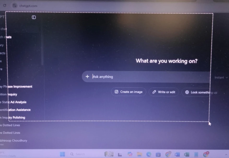 How to Take a Screenshot on a Lenovo Laptop (Windows 10 & 11) 6 Windows Snipping Tool overlay showing a user dragging to select the screen area for a screenshot