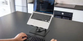 Dygma Releases Sonsei Travel-Friendly Ergonomic Mechanical Keyboard Dygma Sonsei split ergonomic keyboard paired with a laptop on a desktop workstation
