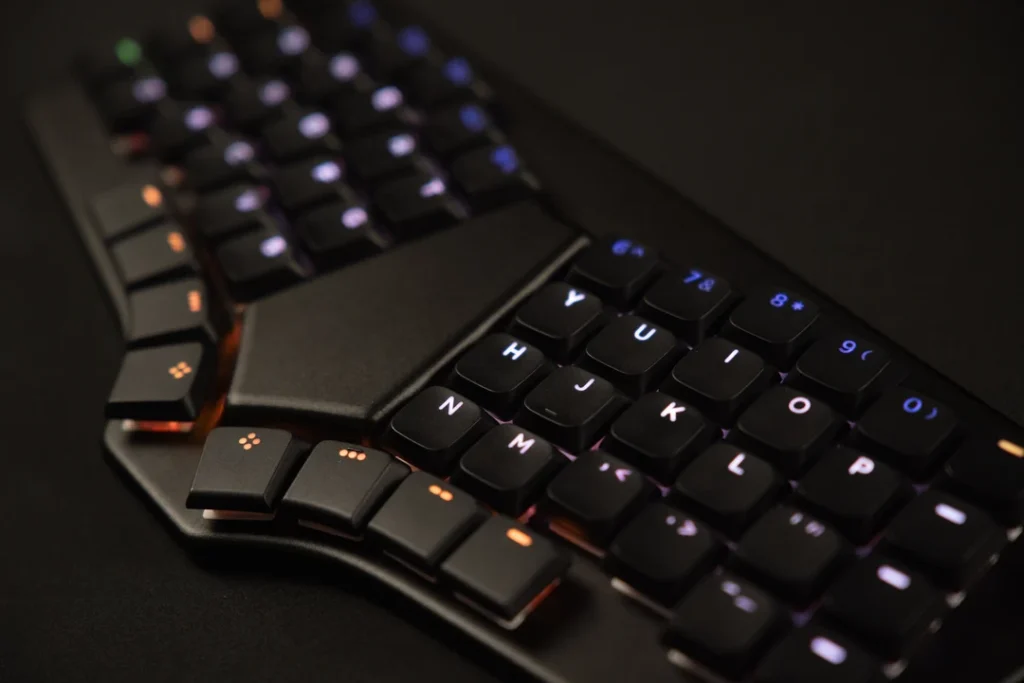 Dygma Releases Sonsei Travel-Friendly Ergonomic Mechanical Keyboard 1 Close-up of the Dygma Sonsei ergonomic split mechanical keyboard with low-profile keycaps and RGB backlighting