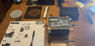 Steam Machine RAM Upgrade is More Complicated Than Users Expected Disassembled Steam Machine with RAM module, tools, and internal components laid out during a memory upgrade.