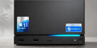 Valve Adds Official Windows Drivers for Steam Machine Front view of a Steam Machine desktop with Windows 11 and SteamOS branding, featuring dual USB ports, an SD card slot, and a blue front light strip.