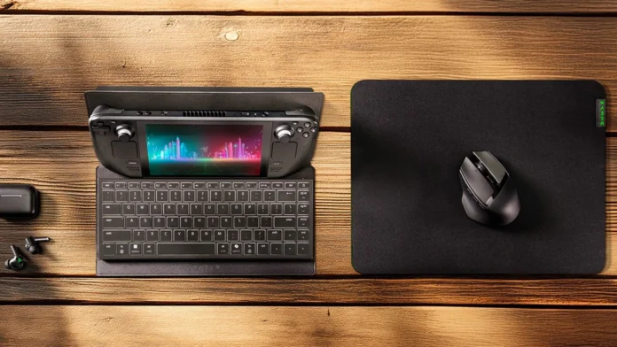 Razer Travel Case Folio with handheld gaming console, keyboard, mouse, and earbuds on a wooden desk.